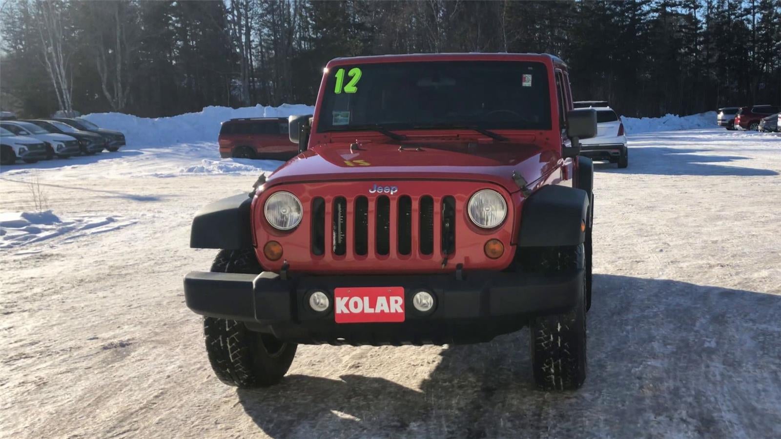 2012 Jeep Wrangler Unlimited — rear three-quarter view