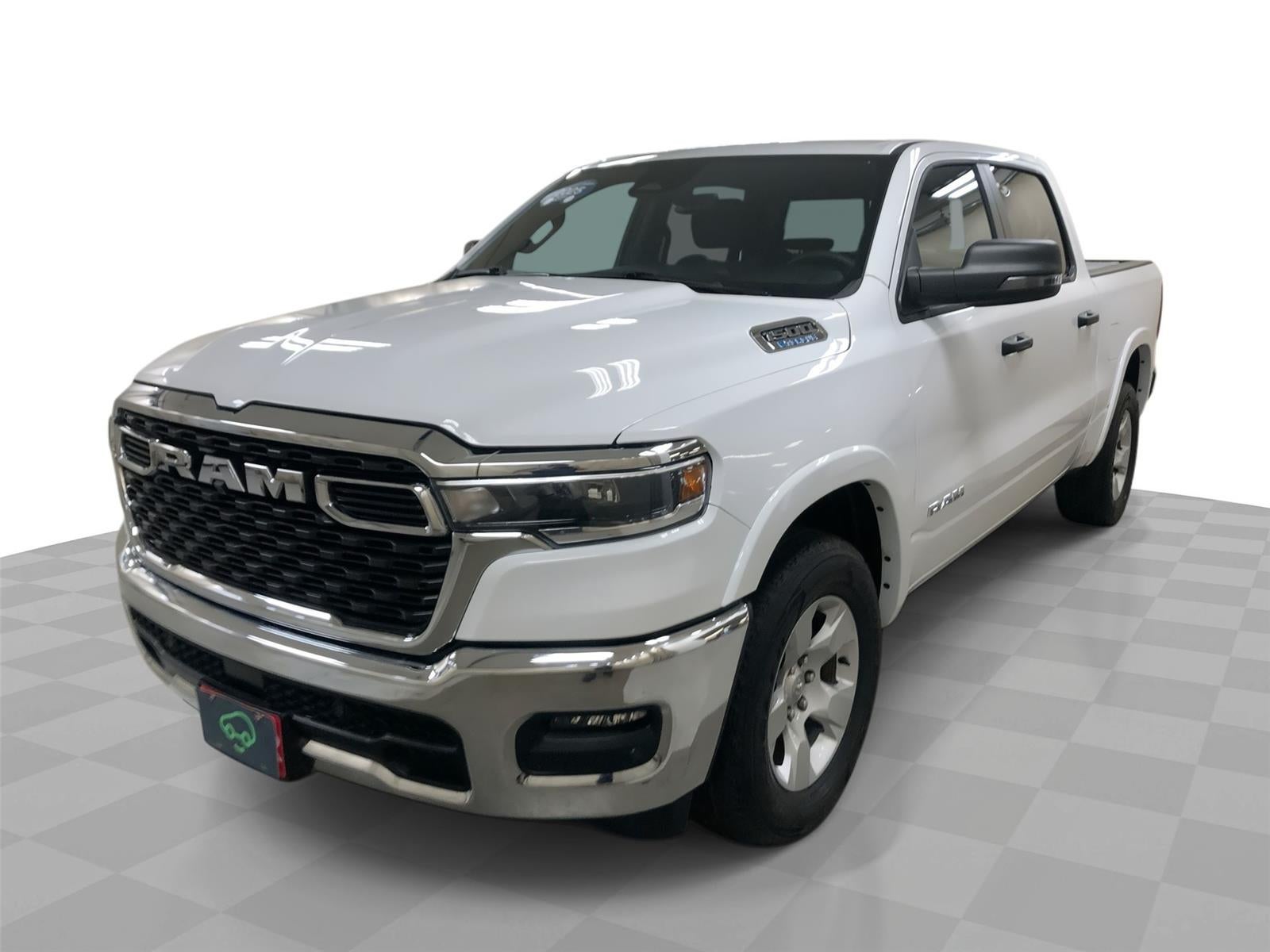 2025 RAM 1500 Big Horn Crew Cab 4x4 5'7" Box in White — front three-quarter view