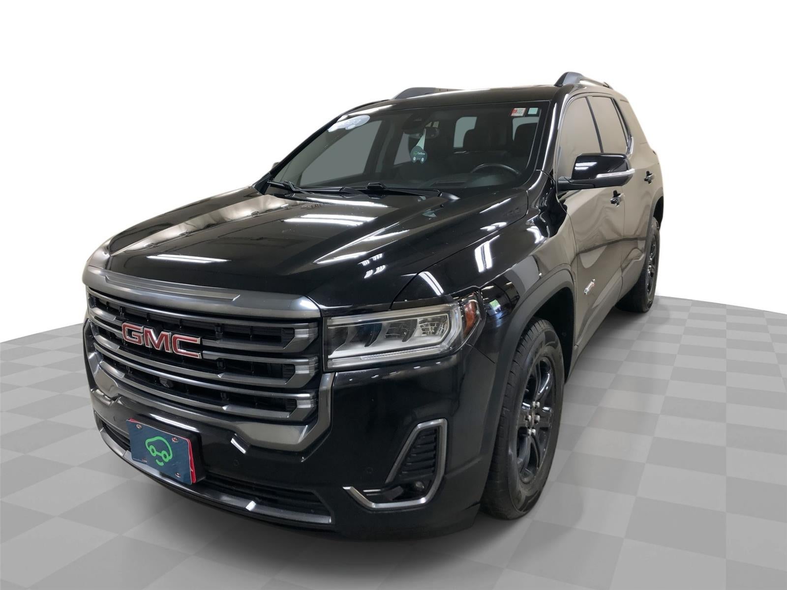 2023 GMC Acadia AT4 in Ebony Twilight Metallic — front three-quarter view