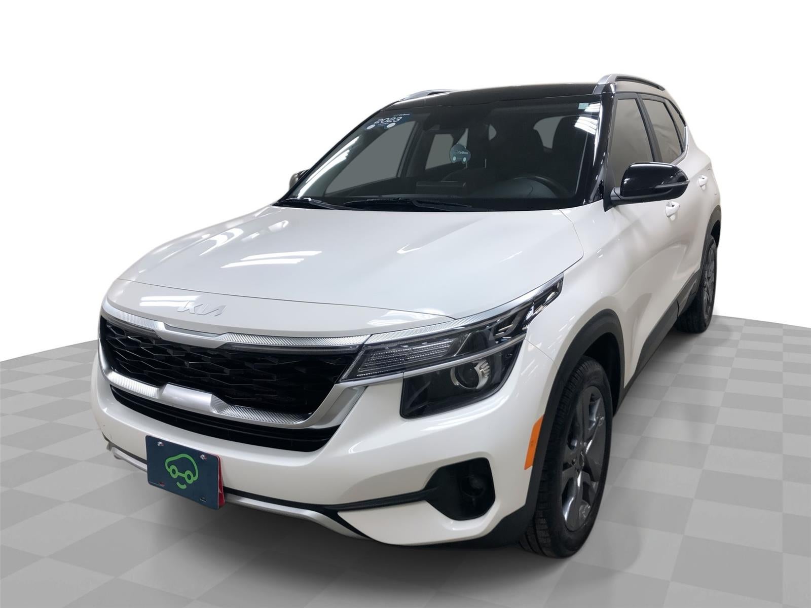 2023 Kia Seltos S in White — front three-quarter view